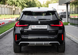 Подержанный автомобиль BMW X1 2024 года (7 фото)