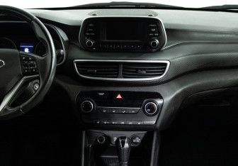 Подержанный автомобиль Hyundai Tucson 2019 года (14 фото)