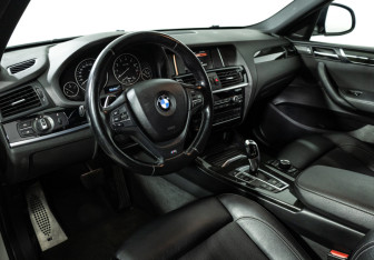 Подержанный автомобиль BMW X4 2015 года (11 фото)