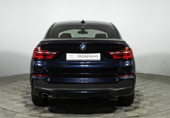 Подержанный автомобиль BMW X4 2015 года (6 фото)
