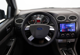 Подержанный автомобиль Ford Focus Hatchback 2010 года (10 фото)