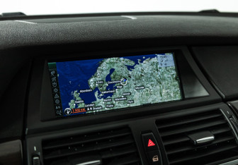 Подержанный автомобиль BMW X6 2013 года (18 фото)