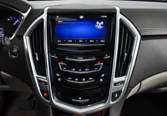 Подержанный автомобиль Cadillac SRX 2014 года (20 фото)