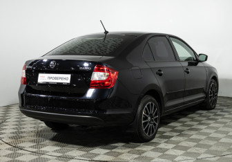Подержанный автомобиль Skoda Rapid Liftback 2015 года (5 фото)