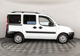 Подержанный автомобиль Fiat Doblo 2012 года (4 фото)