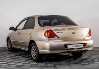 Подержанный автомобиль Kia Spectra Sedan 2006 года (7 фото)