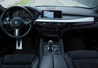 Подержанный автомобиль BMW X6 2018 года (8 фото)