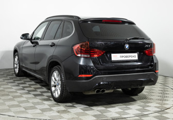 Подержанный автомобиль BMW X1 2013 года (7 фото)