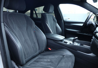 Подержанный автомобиль BMW X6 2018 года (10 фото)