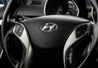 Подержанный автомобиль Hyundai i30 Hatchback 2012 года (11 фото)