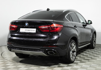 Подержанный автомобиль BMW X6 2016 года (9 фото)