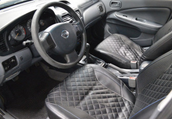 Подержанный автомобиль Nissan Almera Classic 2007 года (10 фото)