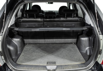 Подержанный автомобиль Kia Sportage 2009 года (17 фото)