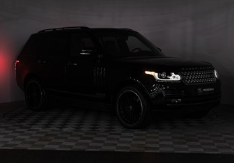 Подержанный автомобиль Land Rover Range Rover 2015 года (32 фото)