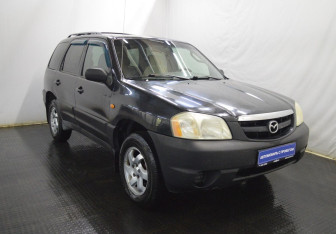 Подержанный автомобиль Mazda Tribute 2001 года (3 фото)