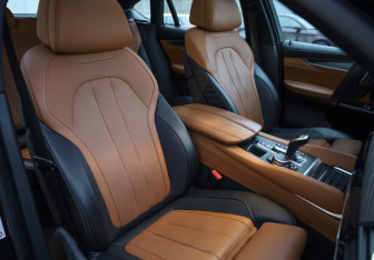 Подержанный автомобиль BMW X6 2016 года (25 фото)