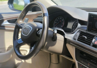 Подержанный автомобиль Audi A6 Sedan 2015 года (20 фото)