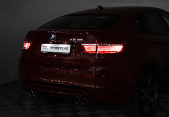 Подержанный автомобиль BMW X6 M 2011 года (26 фото)