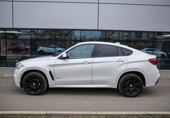 Подержанный автомобиль BMW X6 2018 года (7 фото)