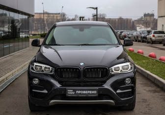 Подержанный автомобиль BMW X6 2015 года (3 фото)