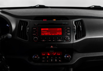 Подержанный автомобиль Kia Sportage 2011 года (16 фото)