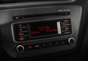 Подержанный автомобиль Kia Rio Sedan 2015 года (13 фото)