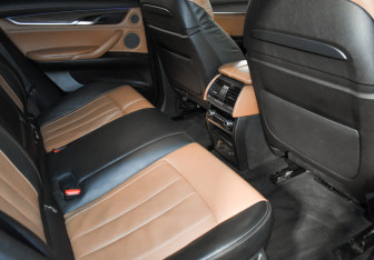 Подержанный автомобиль BMW X6 2014 года (14 фото)