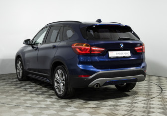 Подержанный автомобиль BMW X1 2017 года (7 фото)