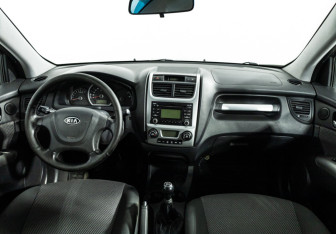 Подержанный автомобиль Kia Sportage 2010 года (13 фото)
