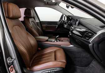 Подержанный автомобиль BMW X6 2017 года (25 фото)