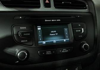 Подержанный автомобиль Kia Ceed Wagon 2014 года (16 фото)