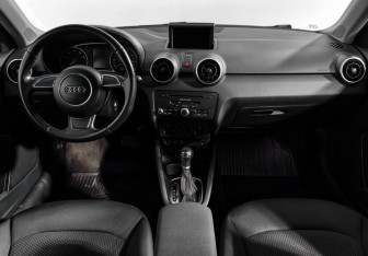 Подержанный автомобиль Audi A1 2014 года (14 фото)