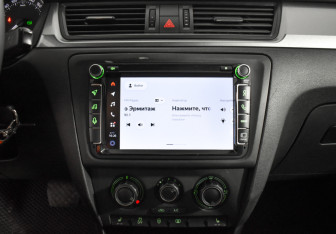 Подержанный автомобиль Skoda Rapid Liftback 2014 года (15 фото)