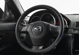 Подержанный автомобиль Mazda 3 Sedan 2007 года (14 фото)