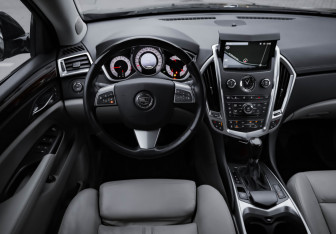 Подержанный автомобиль Cadillac SRX 2012 года (13 фото)