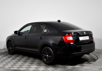 Подержанный автомобиль Skoda Rapid Liftback 2015 года (7 фото)