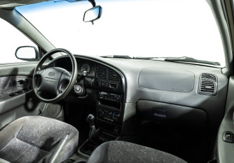 Подержанный автомобиль Kia Spectra Sedan 2007 года (9 фото)