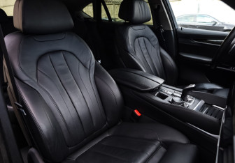 Подержанный автомобиль BMW X6 2016 года (15 фото)