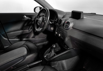 Подержанный автомобиль Audi A1 2014 года (13 фото)