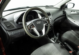 Подержанный автомобиль Hyundai Solaris Sedan 2013 года (11 фото)