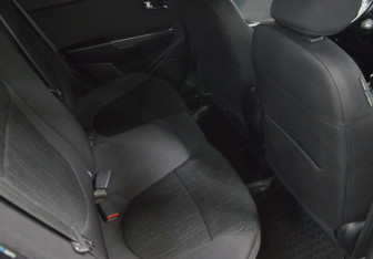 Подержанный автомобиль Kia Rio Sedan 2015 года (13 фото)