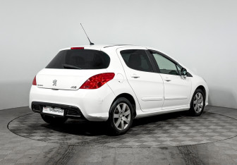 Подержанный автомобиль Peugeot 308 Hatchback 2010 года (5 фото)