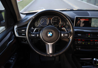 Подержанный автомобиль BMW X5 2014 года (9 фото)