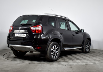 Подержанный автомобиль Nissan Terrano 2014 года (5 фото)
