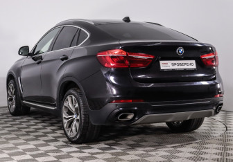 Подержанный автомобиль BMW X6 2016 года (14 фото)