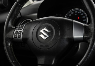 Подержанный автомобиль Suzuki Swift Hatchback 2010 года (11 фото)