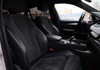Подержанный автомобиль BMW X6 2018 года (22 фото)