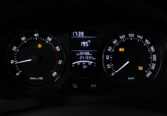 Подержанный автомобиль Skoda Rapid Liftback 2014 года (12 фото)