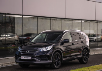 Подержанный автомобиль Honda CR-V 2013 года (3 фото)
