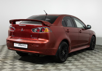 Подержанный автомобиль Mitsubishi Lancer Sedan 2012 года (5 фото)